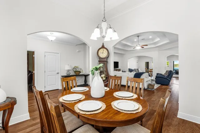 an aerial view of a house with a lake view