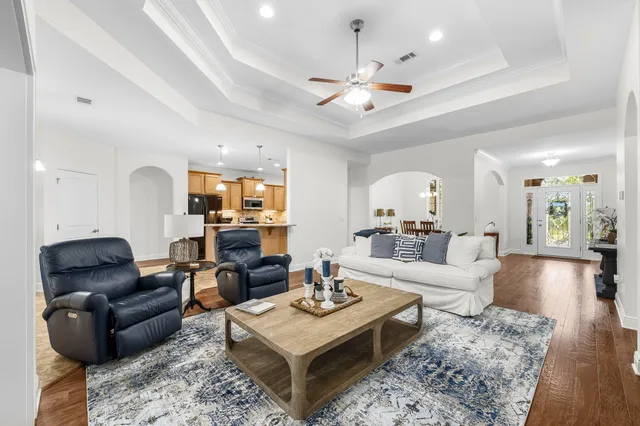 a view of a lake with houses in the background