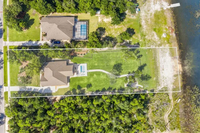 $825,000 | 169 Lake Merial Boulevard, Southport, FL 32409