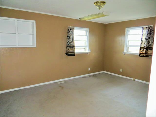 125 Hunter Road Fayetteville, TN 37334 - Photo 4 of 14 an empty room with windows