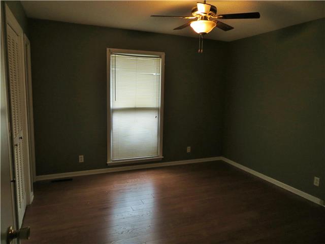 125 Hunter Road Fayetteville, TN 37334 - Photo 6 of 14 a view of wooden floor and chandelier fan in a room