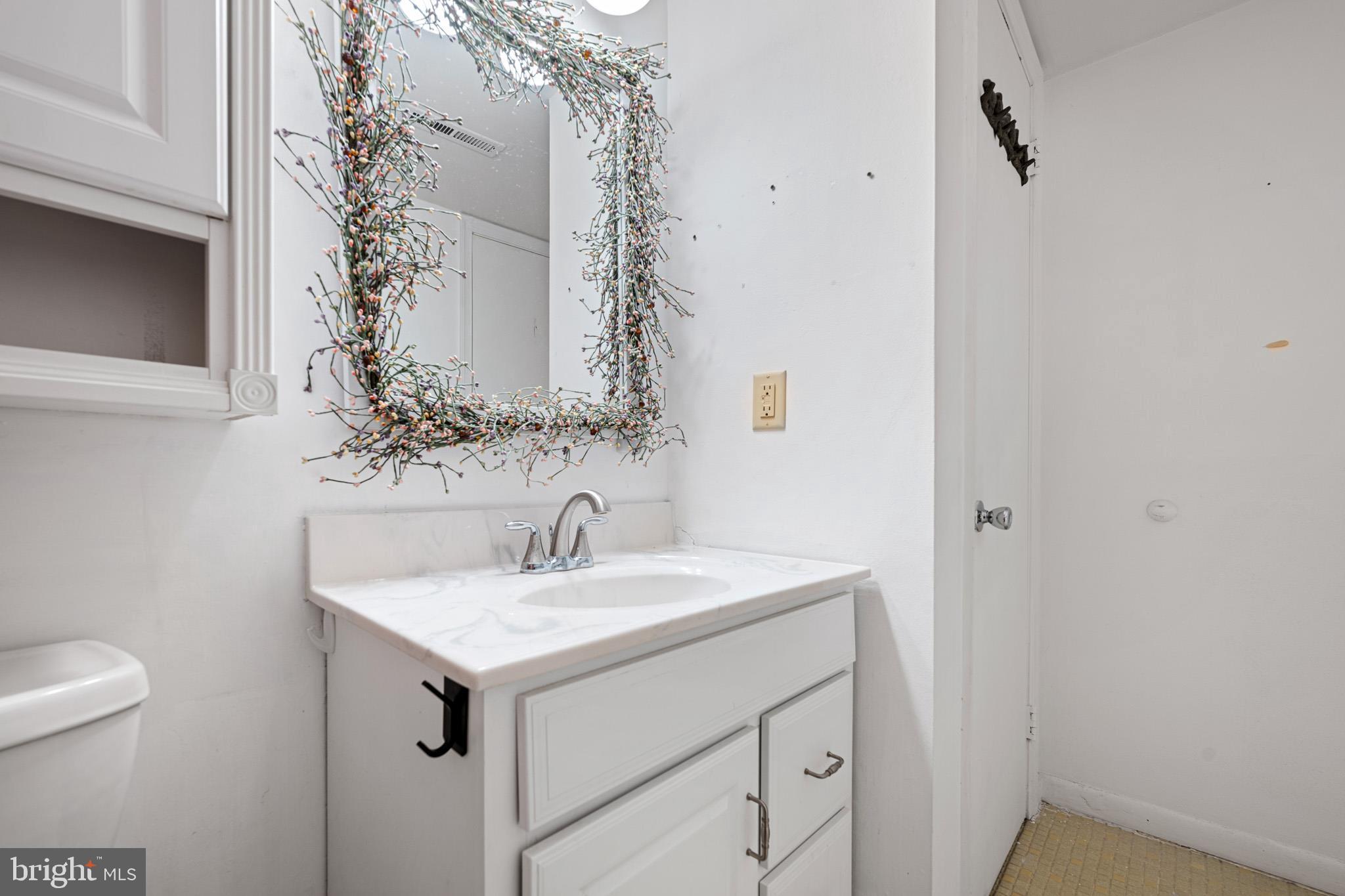 6 Fox Hall Road Dover, DE 19904 - Photo 36 of 41 a bathroom with a sink and a toilet