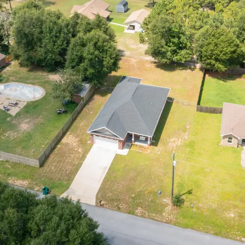a view of a yard with an outdoor space