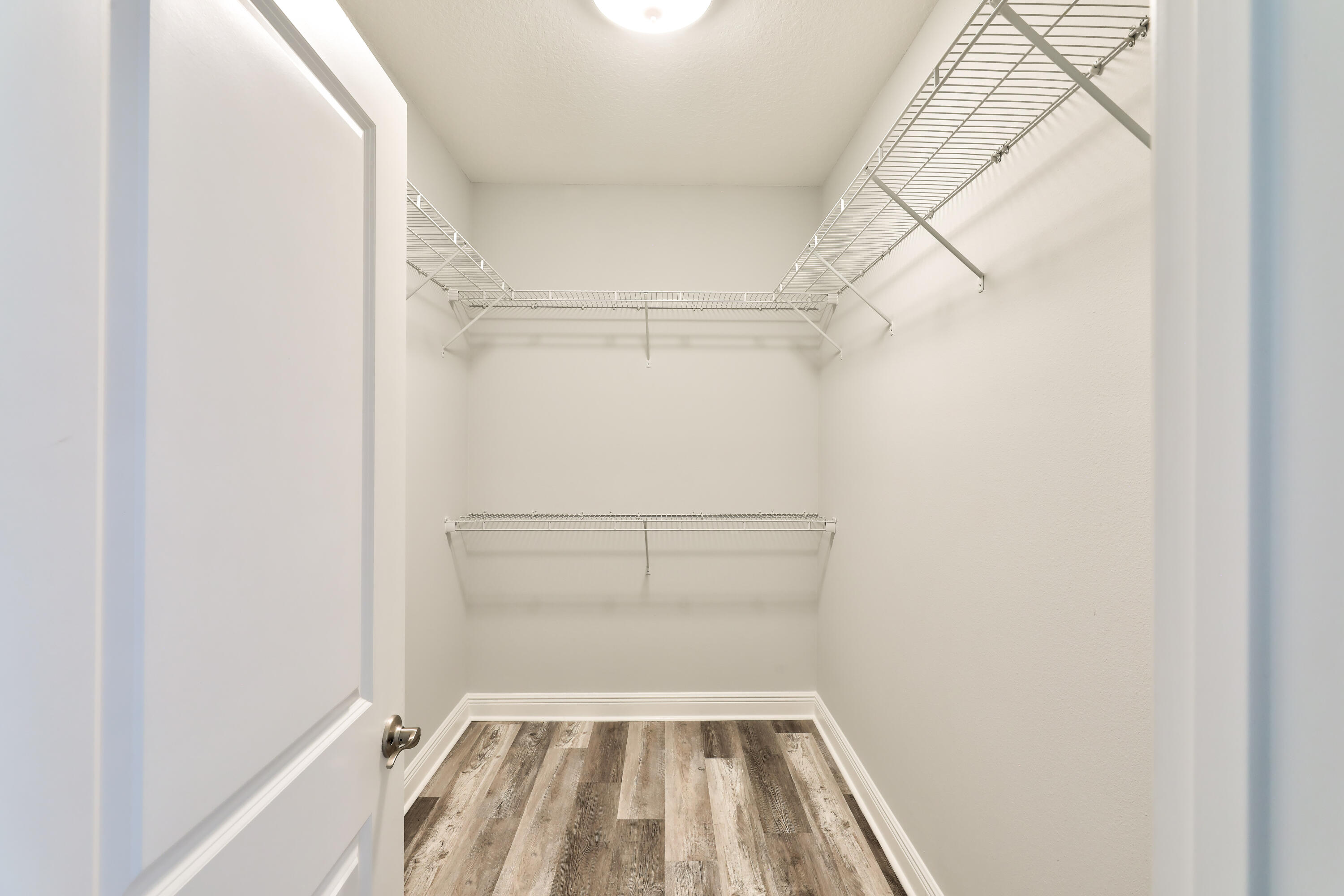 6160 Hayes Drive Crestview, FL 32539 - Photo 33 of 45 a view of a room with racks on the wall