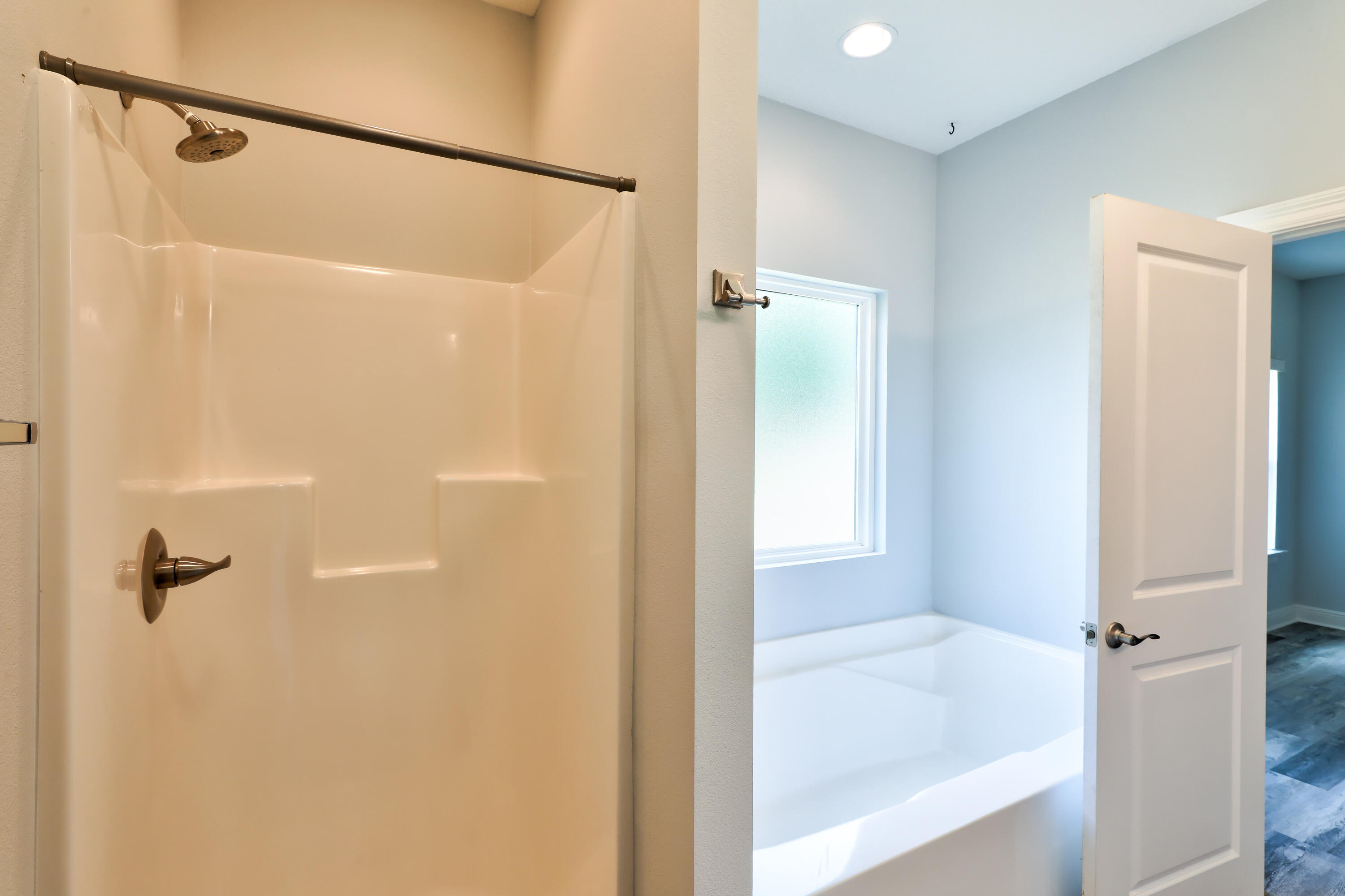 6160 Hayes Drive Crestview, FL 32539 - Photo 35 of 45 a bathroom that has a glass shower door