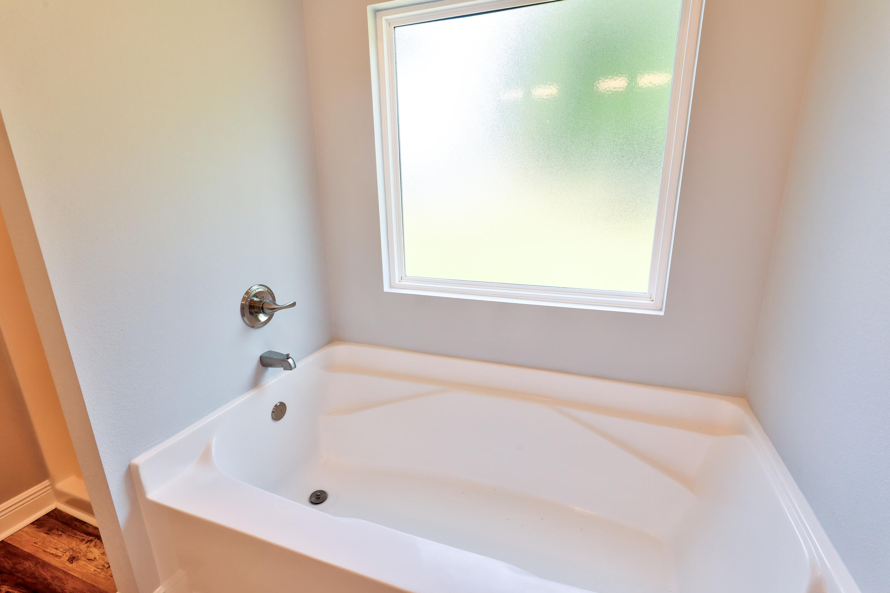 6160 Hayes Drive Crestview, FL 32539 - Photo 36 of 45 a white bath tub sitting in a bathroom