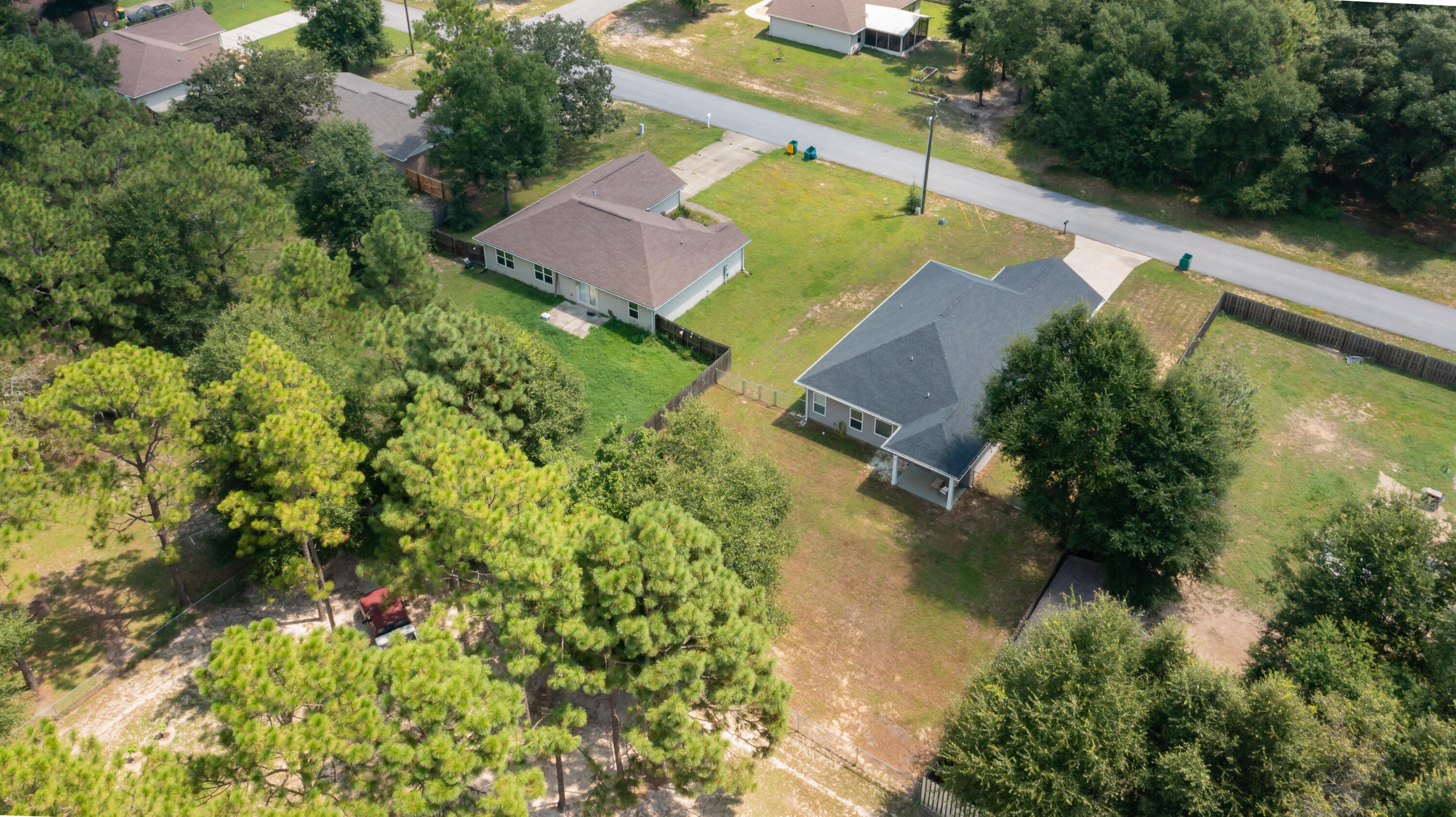 6160 Hayes Drive Crestview, FL 32539 - Photo 4 of 45 an aerial view of house with yard swimming pool and outdoor seating