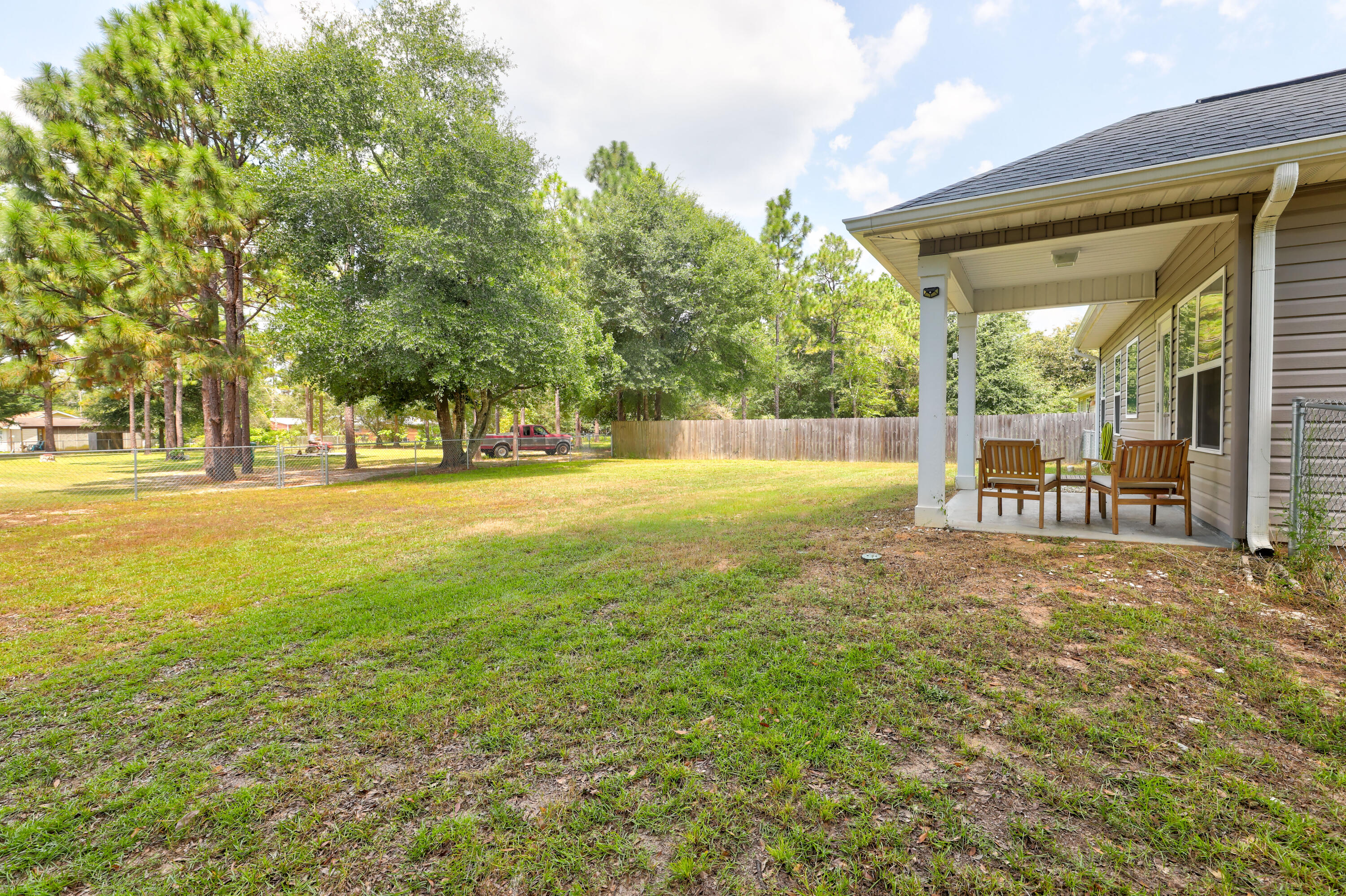 6160 Hayes Drive Crestview, FL 32539 - Photo 42 of 45 a view of an outdoor space and basketball court