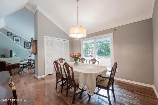 a kitchen with a stove a sink and a refrigerator
