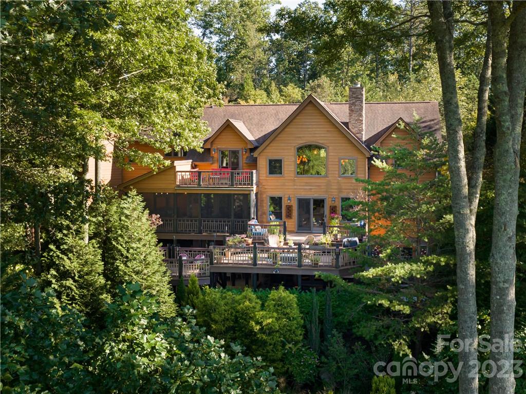 649 Morgan Hill Road Fairview, NC 28730 - Photo 16 of 48 a front view of a house with a yard