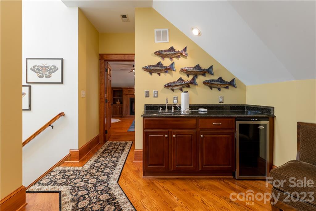 649 Morgan Hill Road Fairview, NC 28730 - Photo 22 of 48 a room with a table and chairs