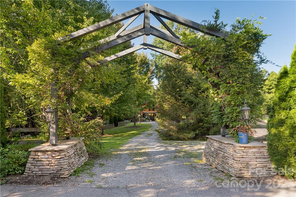 649 Morgan Hill Road Fairview, NC 28730 - Photo 30 of 48 a tall building with trees in the background