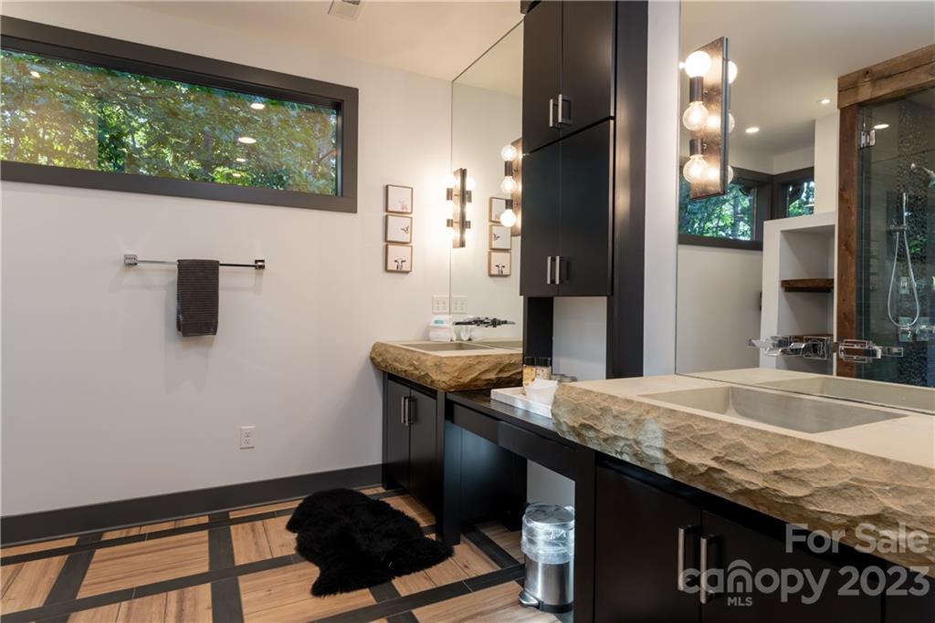 649 Morgan Hill Road Fairview, NC 28730 - Photo 35 of 48 a dining table chair next to a window