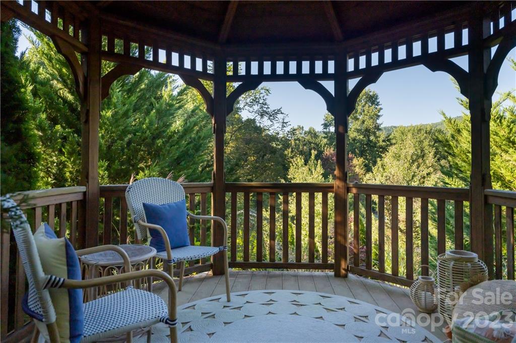649 Morgan Hill Road Fairview, NC 28730 - Photo 43 of 48 a view of two chairs in the balcony