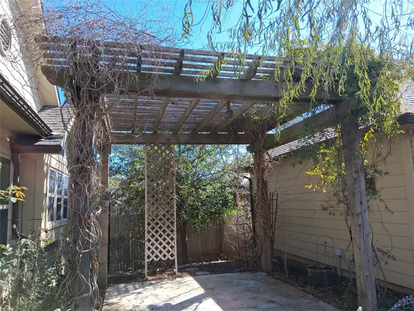 a view of a house with a tree