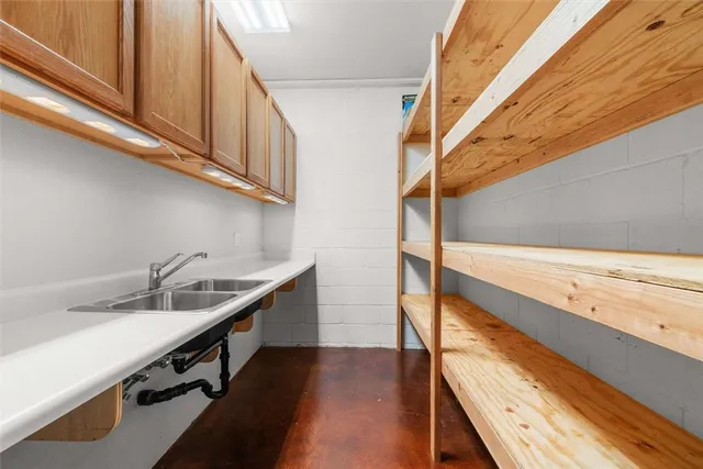 a bathroom with a sink and a window