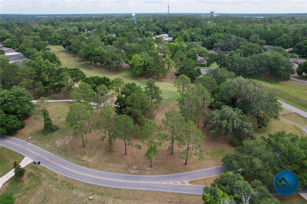 6214 Northwest 105th Avenue Alachua, FL 32615 - Photo 11 of 19 an aerial view of residential house with outdoor space and trees around