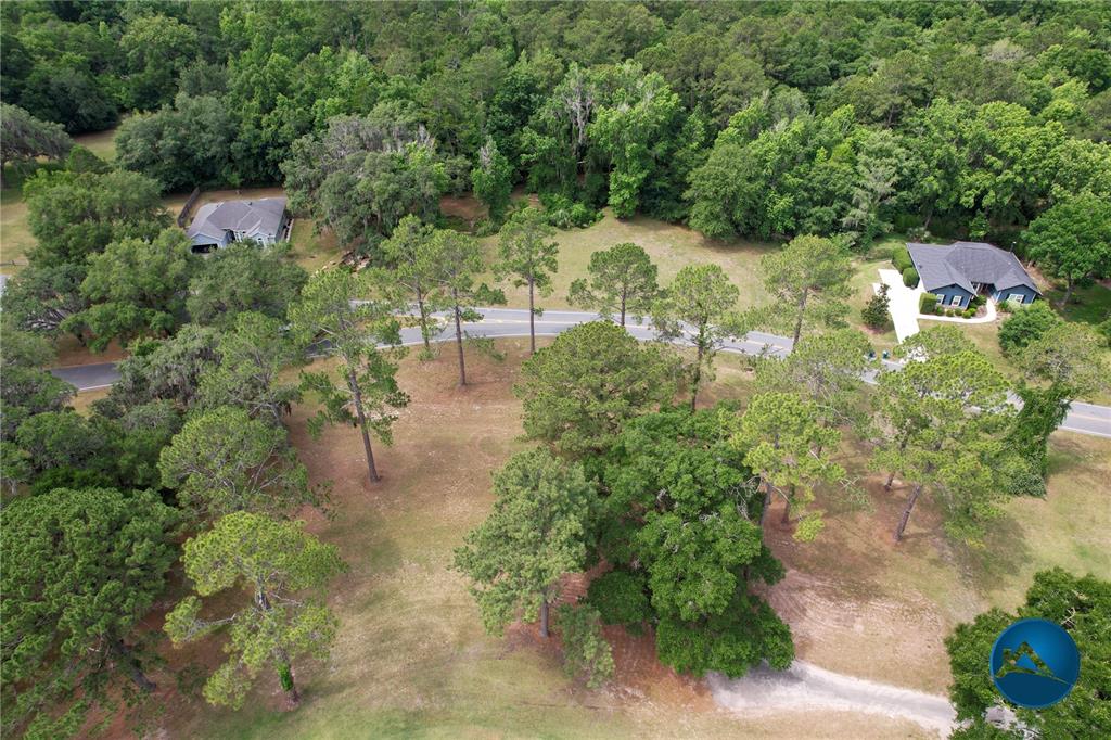 6214 Northwest 105th Avenue Alachua, FL 32615 - Photo 14 of 19 a view of a lake with houses