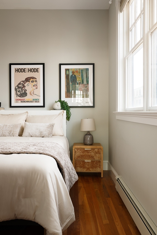 80 Webster Avenue, Unit 2A Somerville, MA 02143 - Photo 16 of 19 a bedroom with bed and window