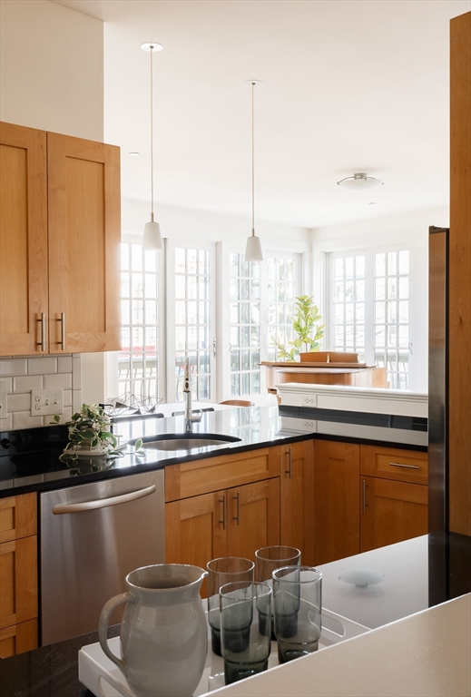 80 Webster Avenue, Unit 2A Somerville, MA 02143 - Photo 5 of 19 a kitchen with a sink and a counter top space