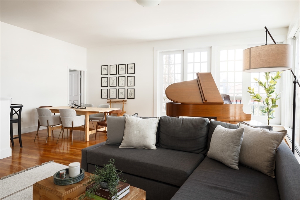 80 Webster Avenue, Unit 2A Somerville, MA 02143 - Photo 10 of 19 a living room with furniture and a couch