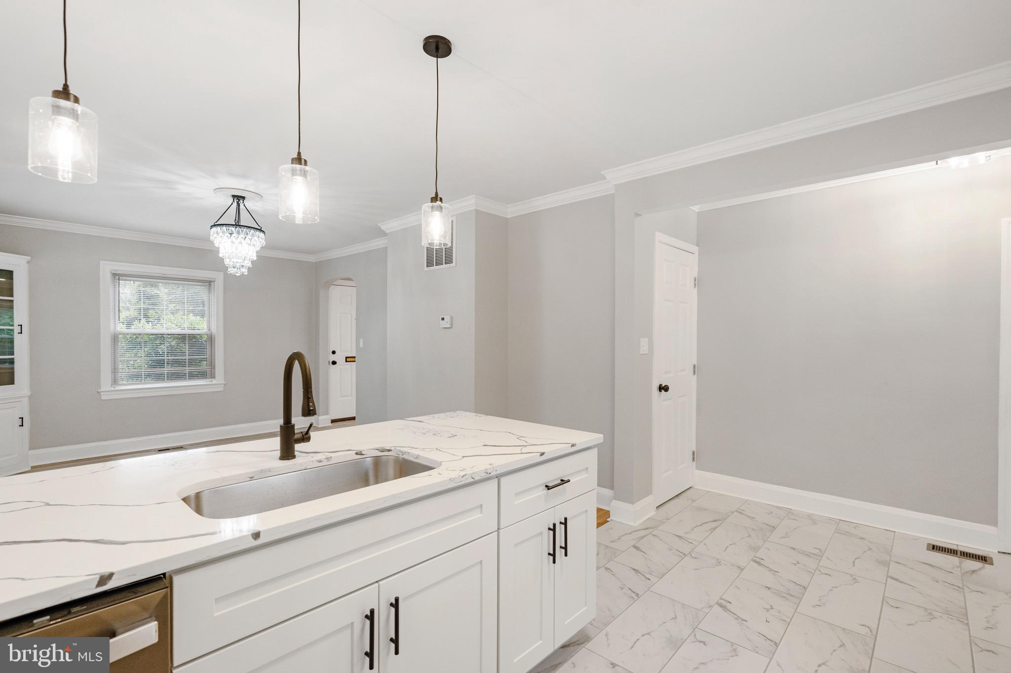 5311 Herring Run Drive Baltimore, MD 21214 - Photo 14 of 43 a bathroom with a sink and a mirror