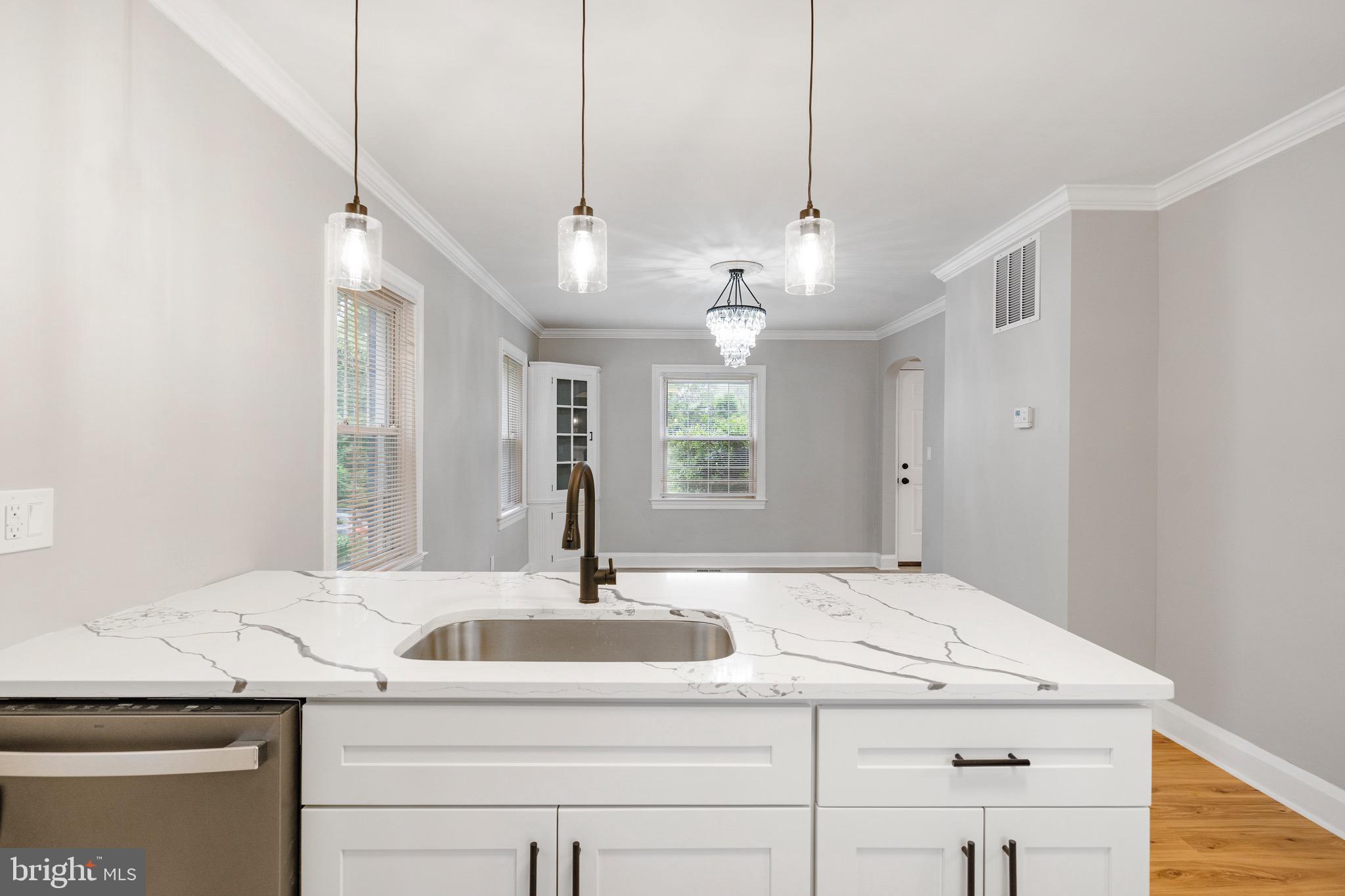 5311 Herring Run Drive Baltimore, MD 21214 - Photo 15 of 43 a bathroom with a sink and a mirror