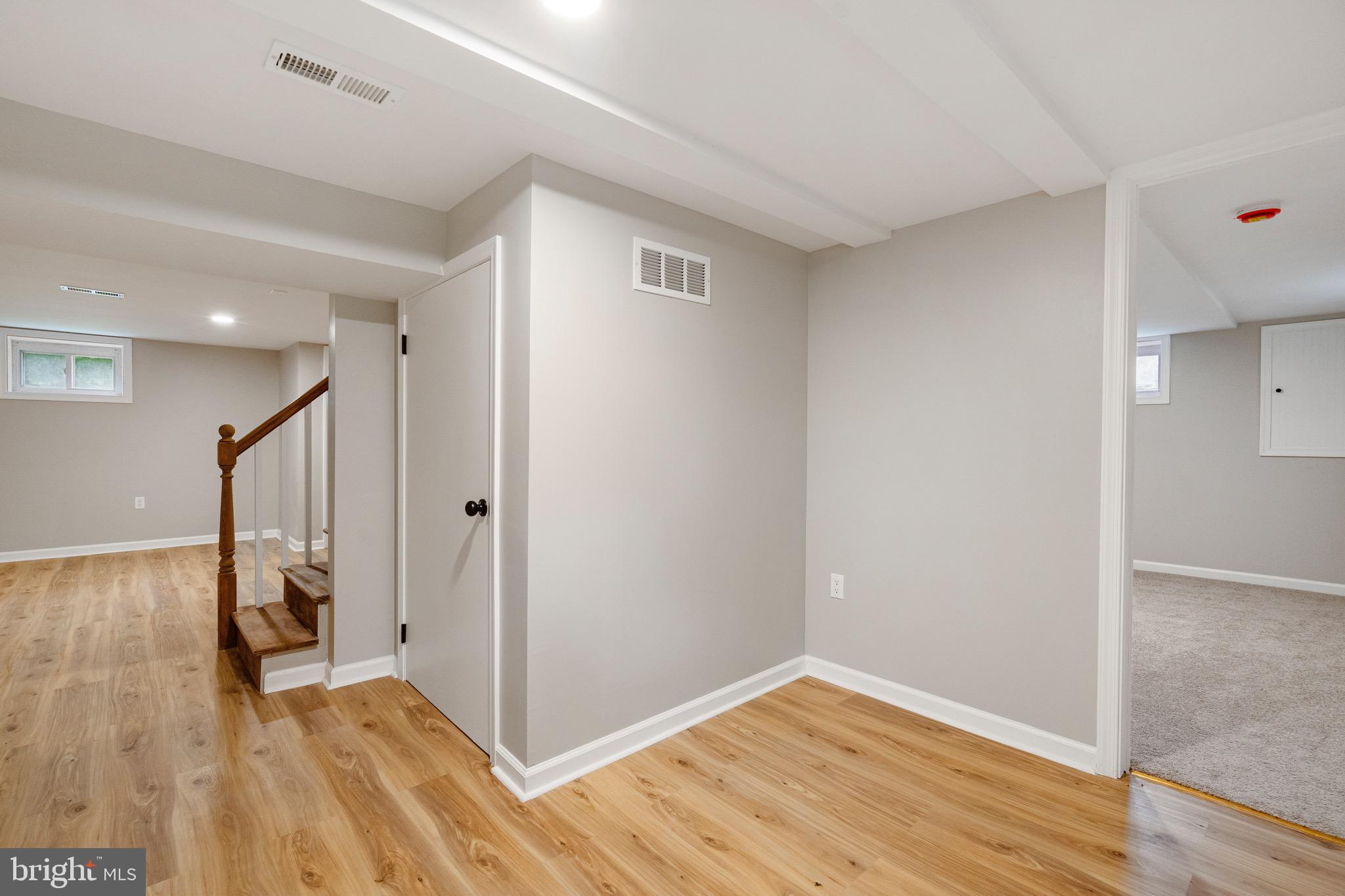 5311 Herring Run Drive Baltimore, MD 21214 - Photo 24 of 43 a view of hallway with wooden floor