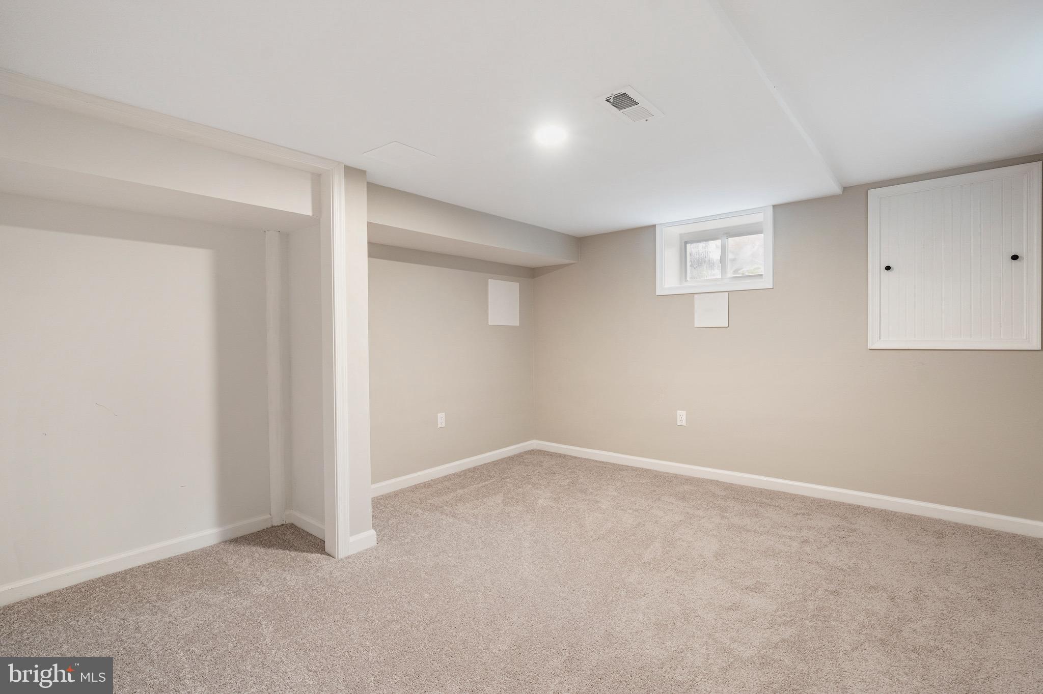 5311 Herring Run Drive Baltimore, MD 21214 - Photo 25 of 43 a view of an empty room with a window