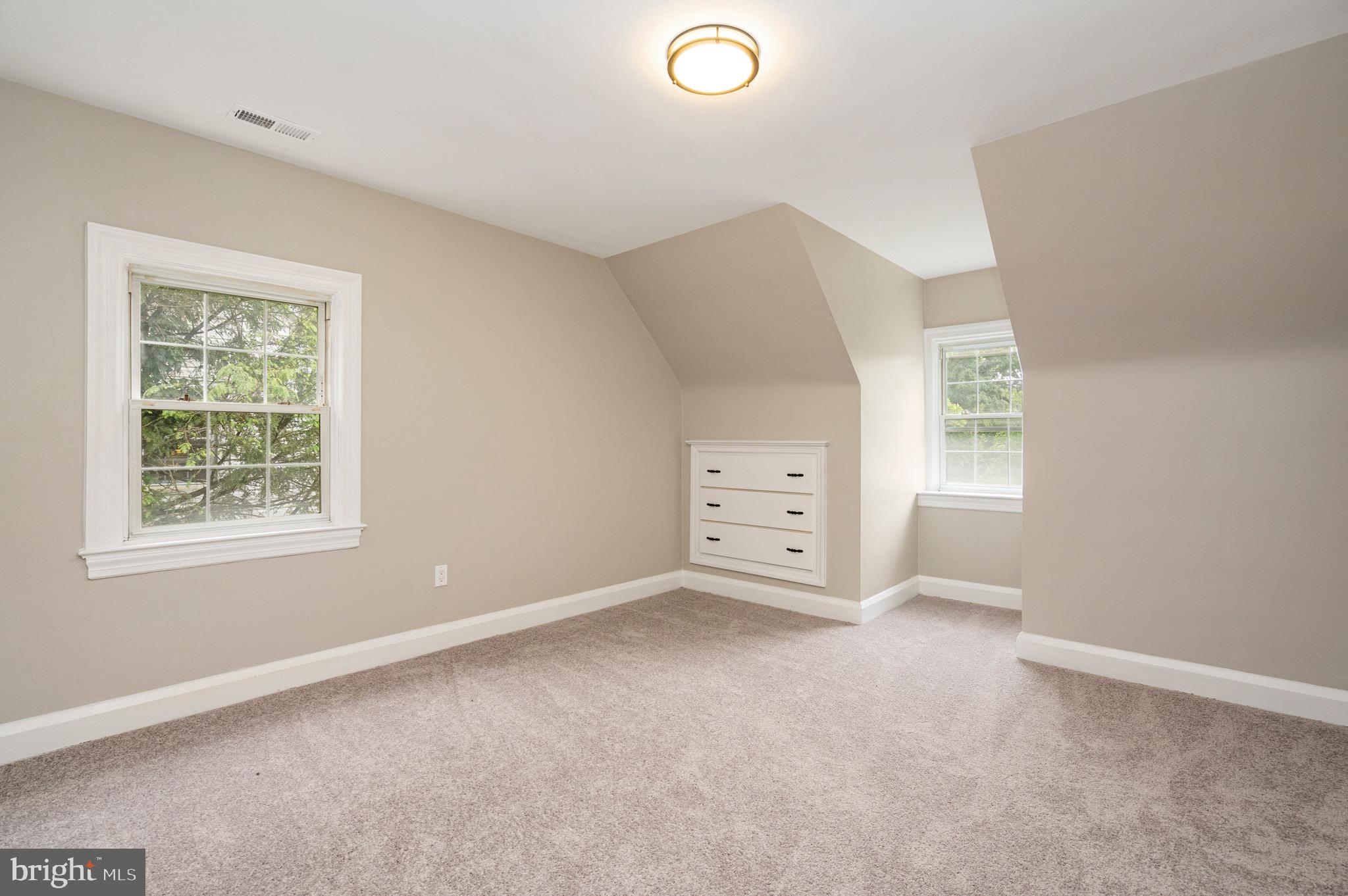 5311 Herring Run Drive Baltimore, MD 21214 - Photo 30 of 43 an empty room with windows