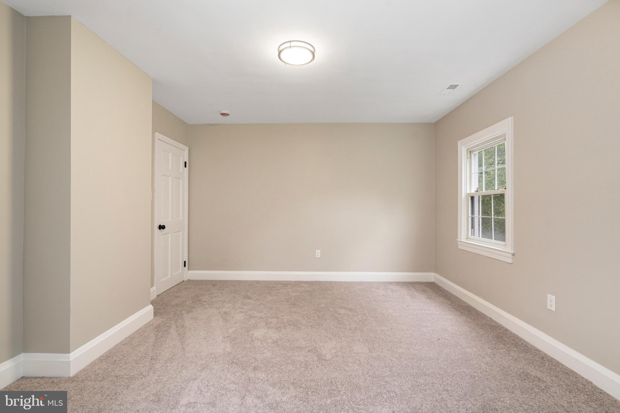 5311 Herring Run Drive Baltimore, MD 21214 - Photo 31 of 43 a view of an empty room with a window