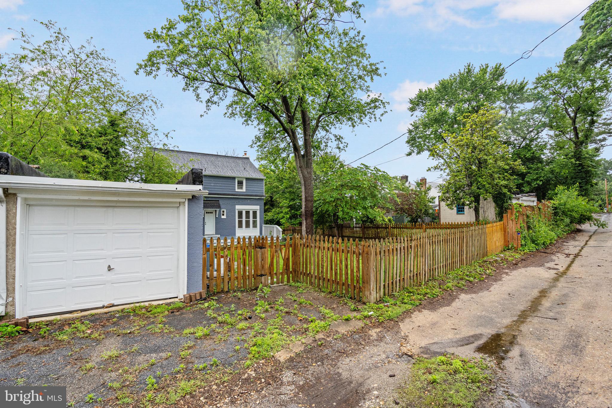 5311 Herring Run Drive Baltimore, MD 21214 - Photo 43 of 43 a front view of a house with a garage