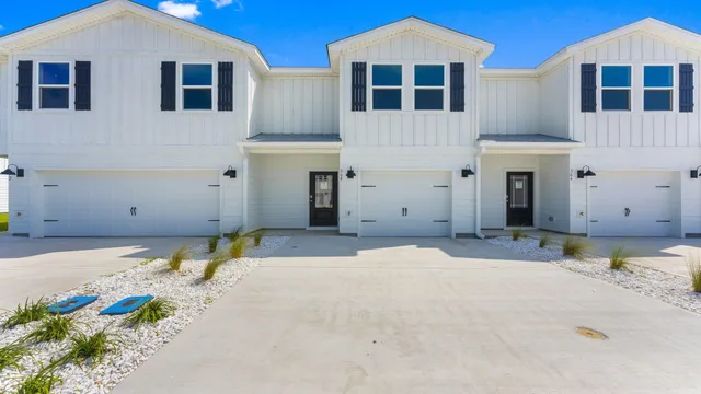 a view of kitchen with wooden floor