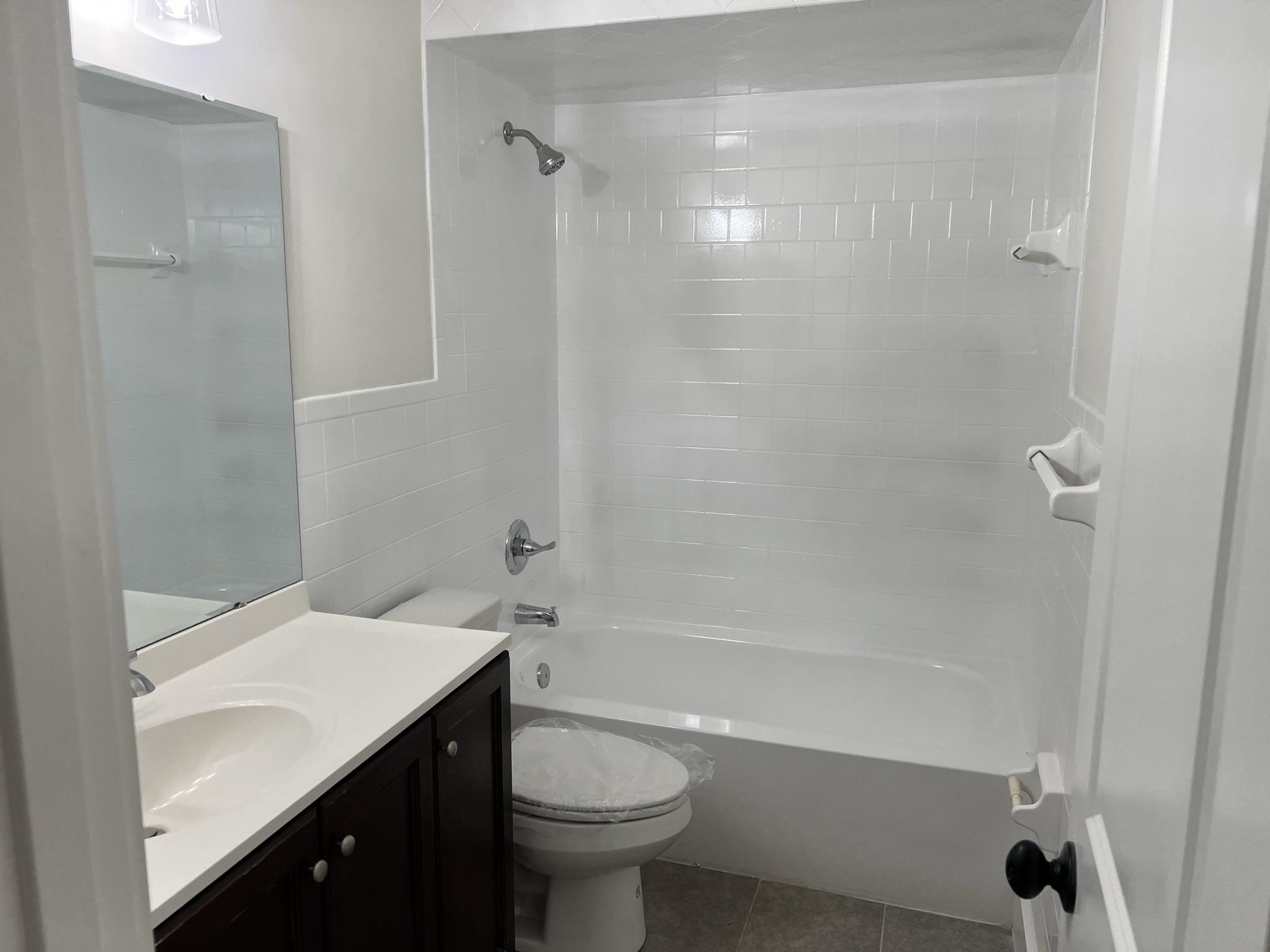 331 Jasmine Road St. Augustine, FL 32086 - Photo 8 of 12 a bathroom with a sink a toilet and shower