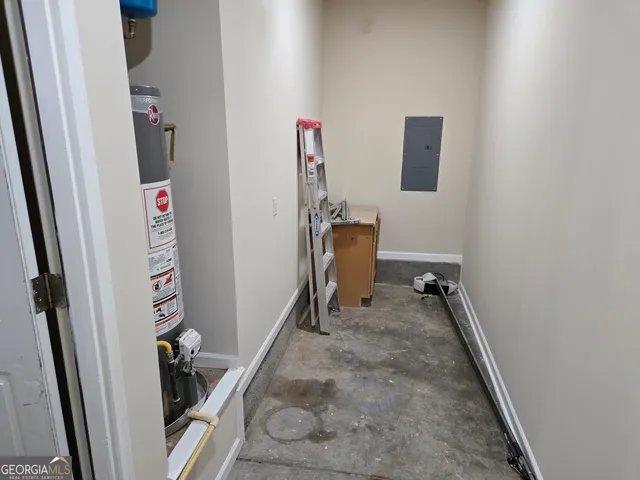 a white toilet sitting next to a bathroom sink