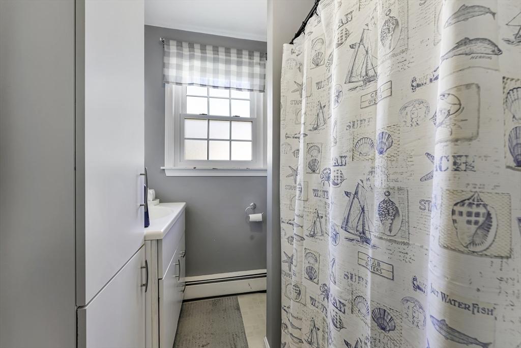 1350 Phillips Road New Bedford, MA 02745 - Photo 11 of 17 a bathroom with a shower and a sink