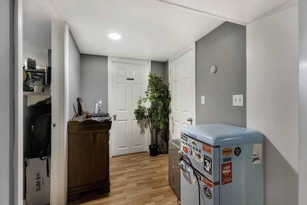 1350 Phillips Road New Bedford, MA 02745 - Photo 15 of 17 a living room with furniture and a fireplace