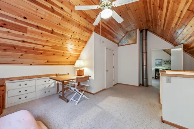 a view of an empty room with cabinet