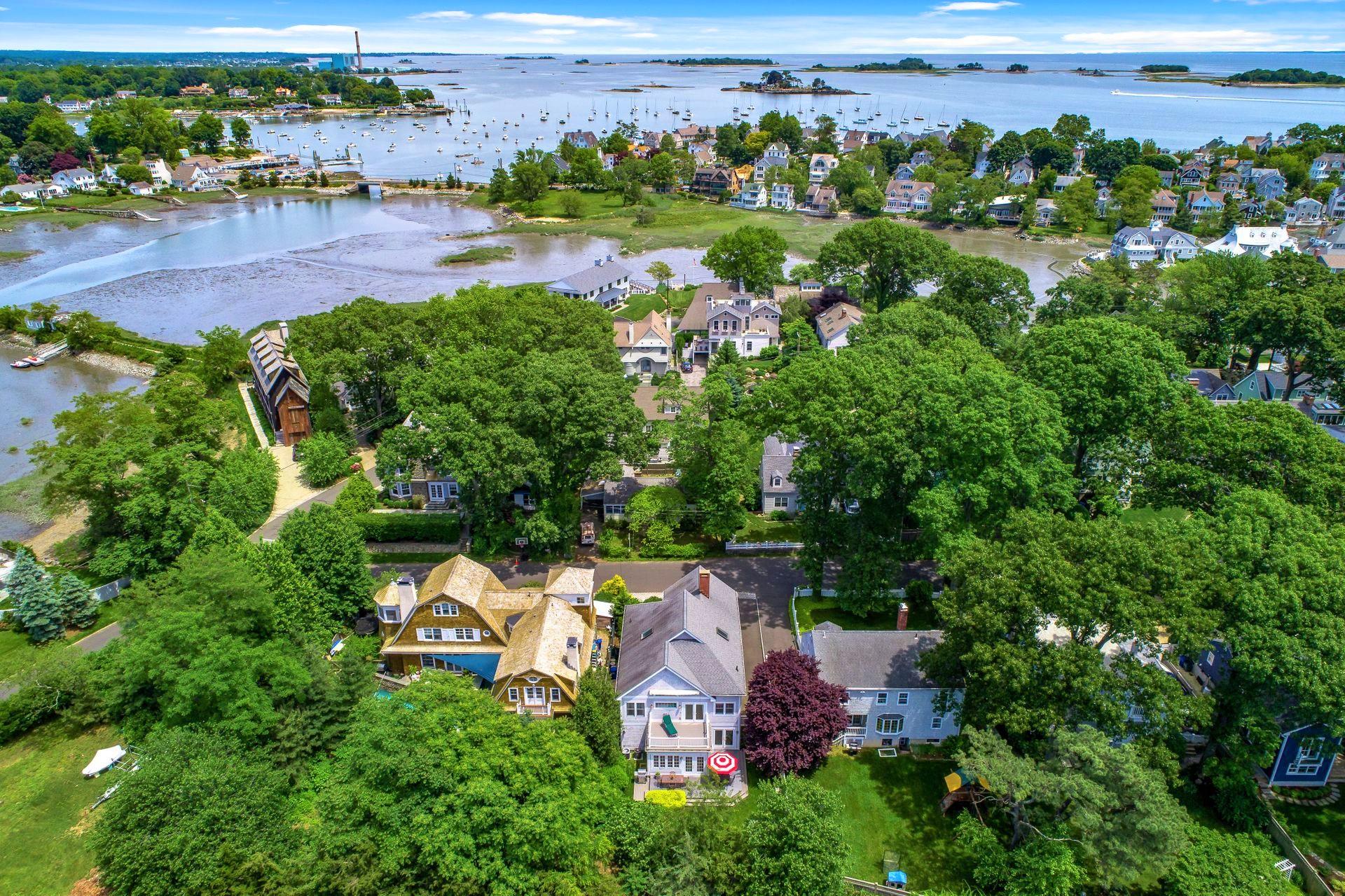 an aerial view of a house with outdoor space