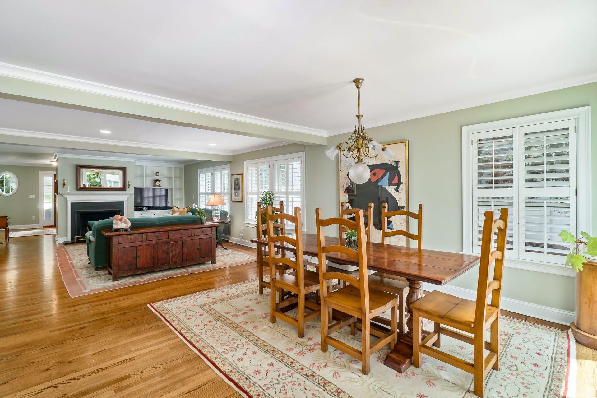 33 Pine Point Road Rowayton, CT 06853 - Photo 11 of 28 a view of a dining room with furniture window and wooden floor
