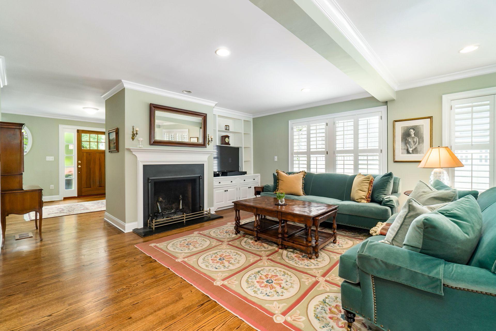 33 Pine Point Road Rowayton, CT 06853 - Photo 5 of 28 a living room with furniture a fireplace and window