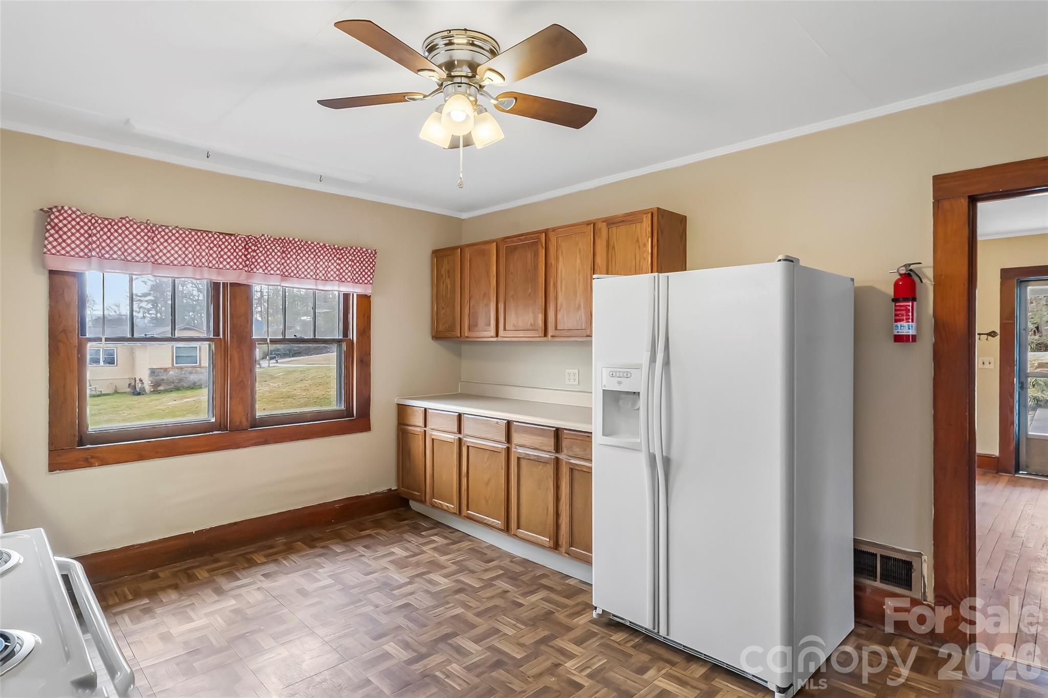 102 Rhododendron Drive Brevard, NC 28712 - Photo 10 of 17 a kitchen with stainless steel appliances granite countertop a refrigerator a oven a sink and dishwasher