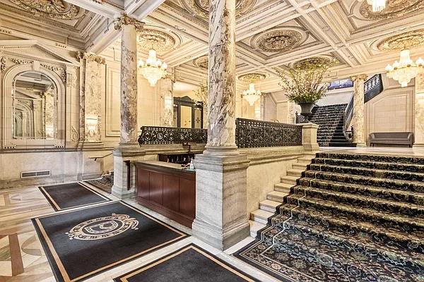 240 Centre Street, Unit 5B Manhattan, NY 10013 - Photo 29 of 37 a kitchen with a stove and a white wooden cabinets