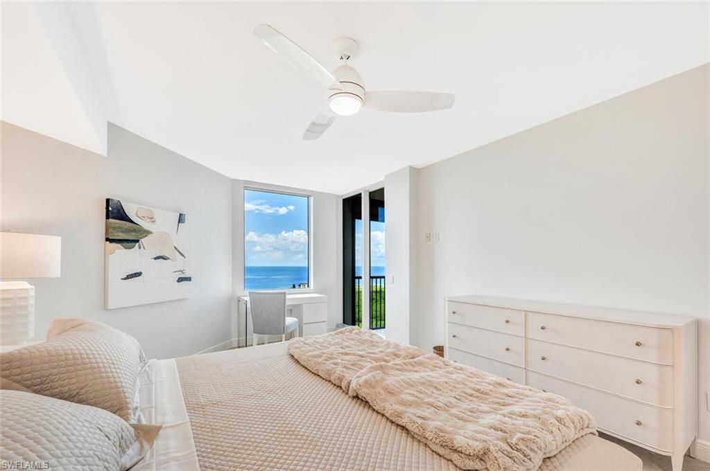 7225 Pelican Bay Boulevard, Unit 2004 Naples, FL 34108 - Photo 17 of 43 Primary Bedroom