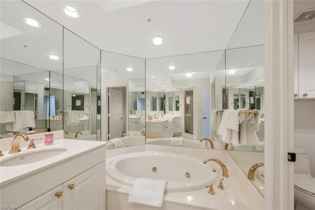 7225 Pelican Bay Boulevard, Unit 2004 Naples, FL 34108 - Photo 21 of 43 Primary Bathroom