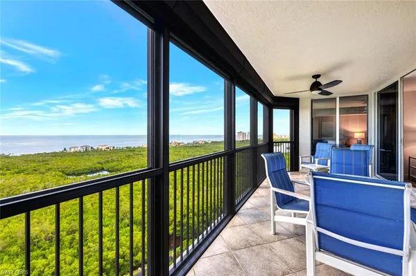 a view of balcony with chairs