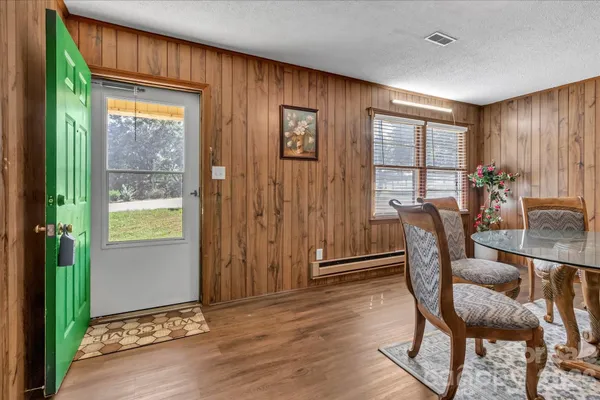 a view of a livingroom with furniture and window