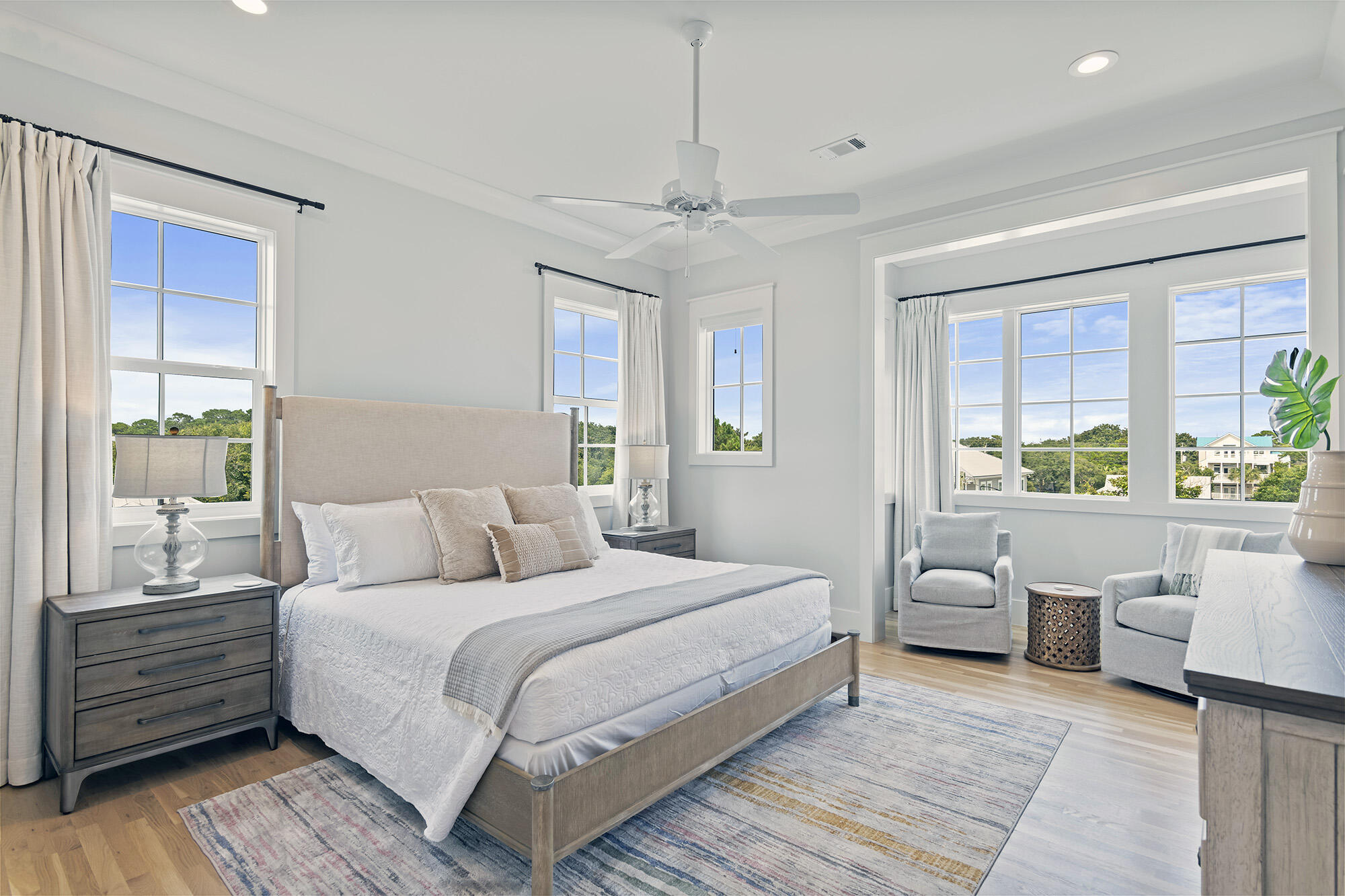 512 Defuniak Street Santa Rosa Beach, FL 32459 - Photo 35 of 44 a bedroom with a large bed and a couch
