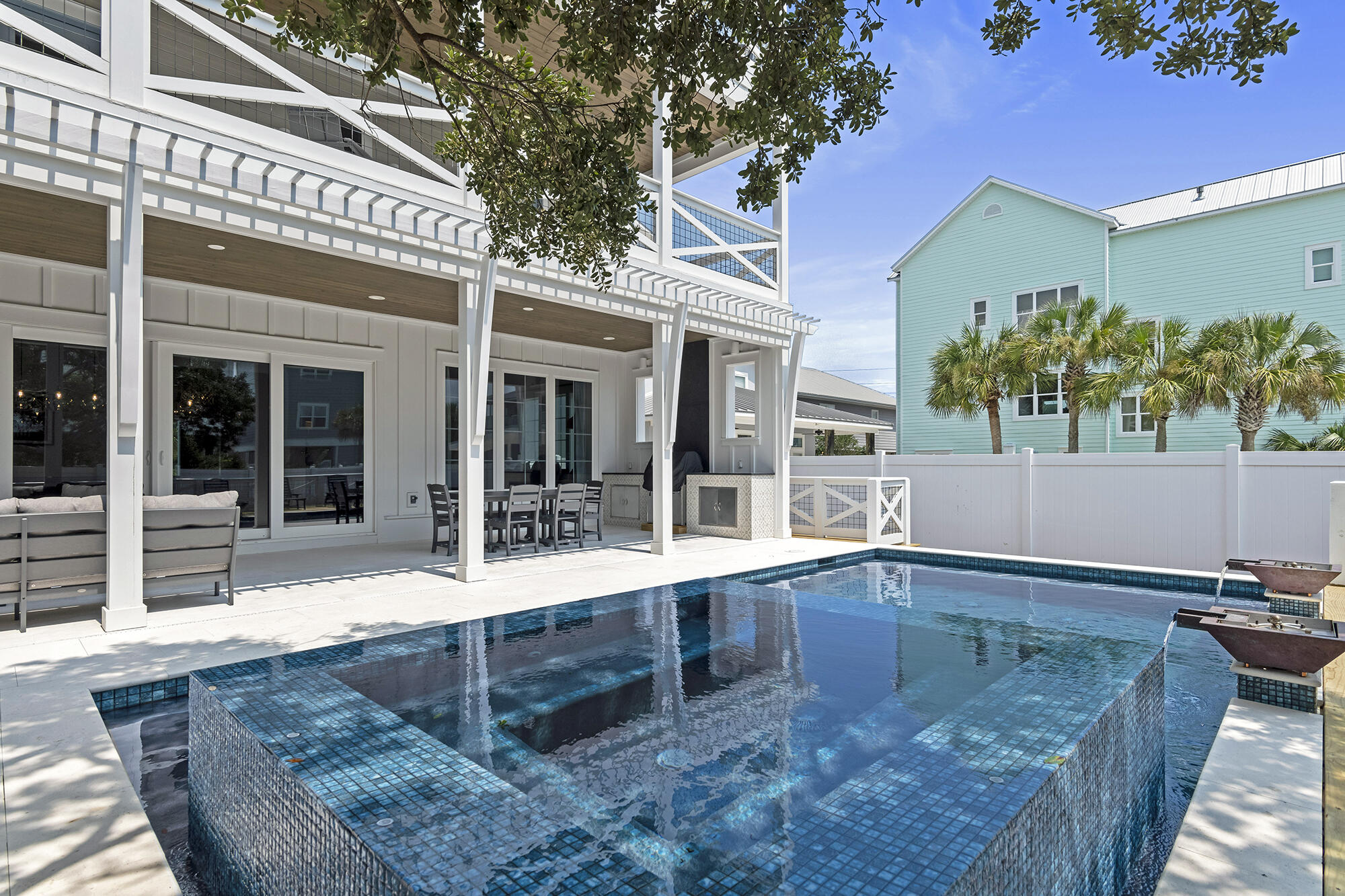 512 Defuniak Street Santa Rosa Beach, FL 32459 - Photo 6 of 44 front view of a house with a patio