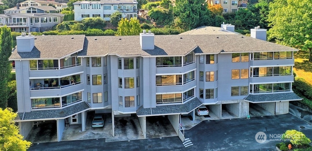 a aerial view of multi story residential apartment building